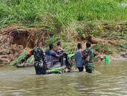Solidaritas Penuh Makna: Prajurit TNI Beraksi Bantu Warga Meyado Melintasi ‘Kali Kaibur’